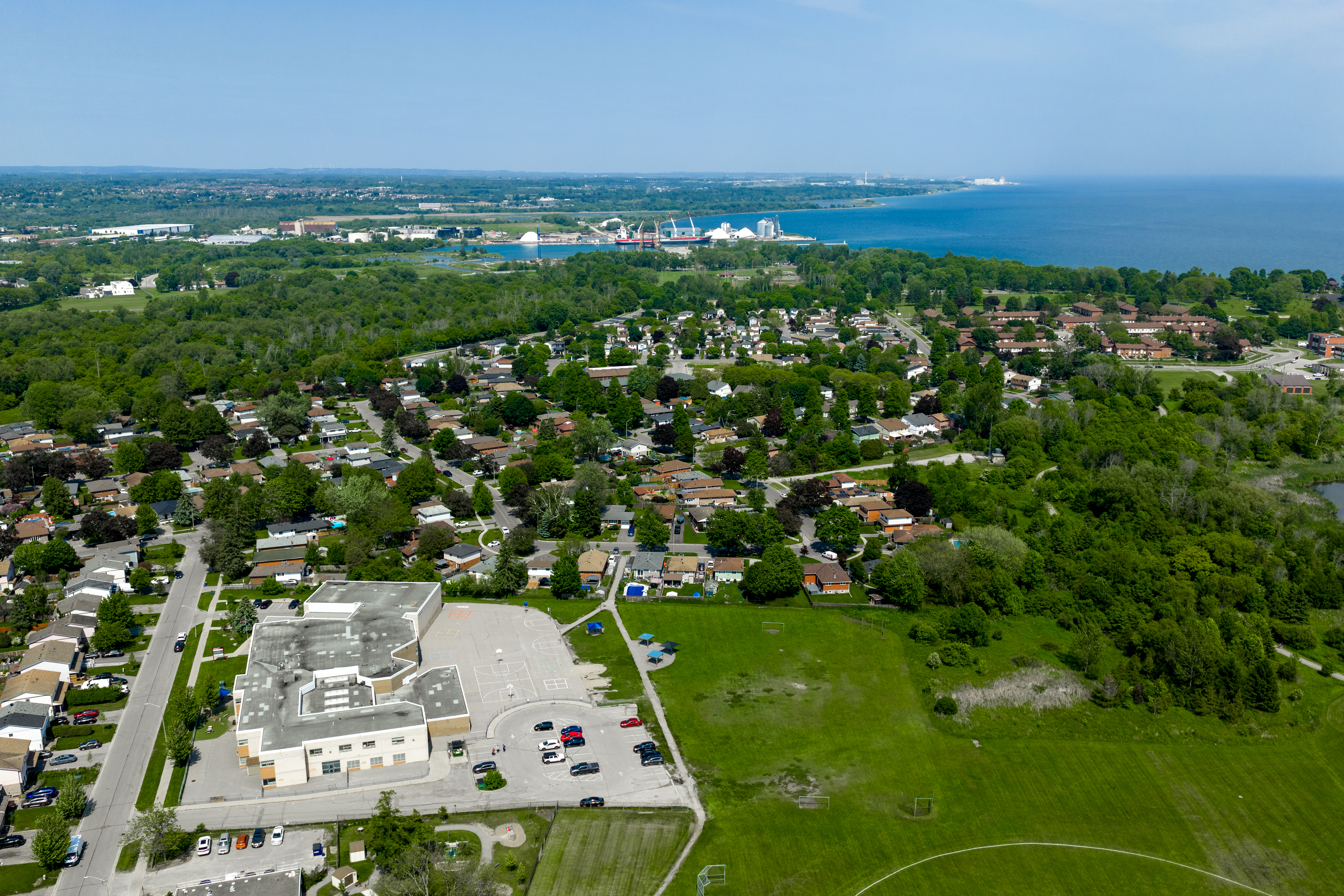 Aerial of City of Oshawa with lake