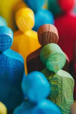 multi-coloured wooden people