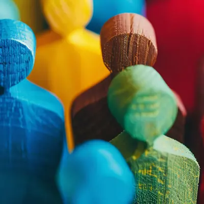 multi-coloured wooden people