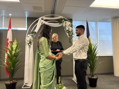 Couple at altar with officiant