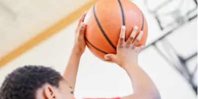 Child playing basketball