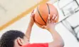 Child playing basketball