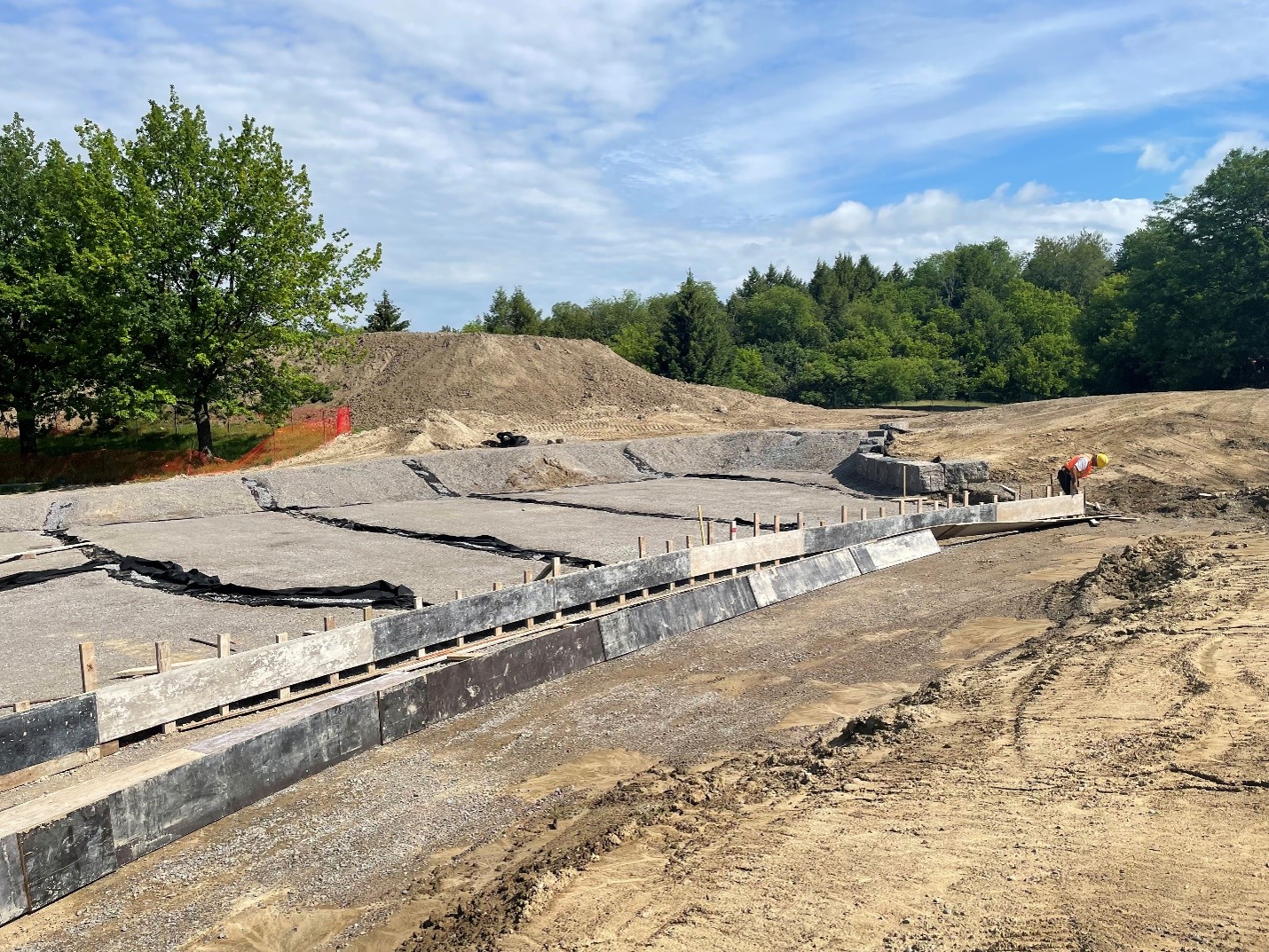 Base preparation and curb forming for new playground area