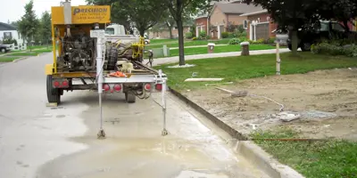 Machine Doing Curb Cut 