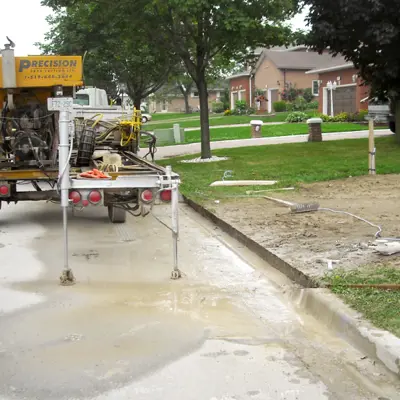 Machine Doing Curb Cut 