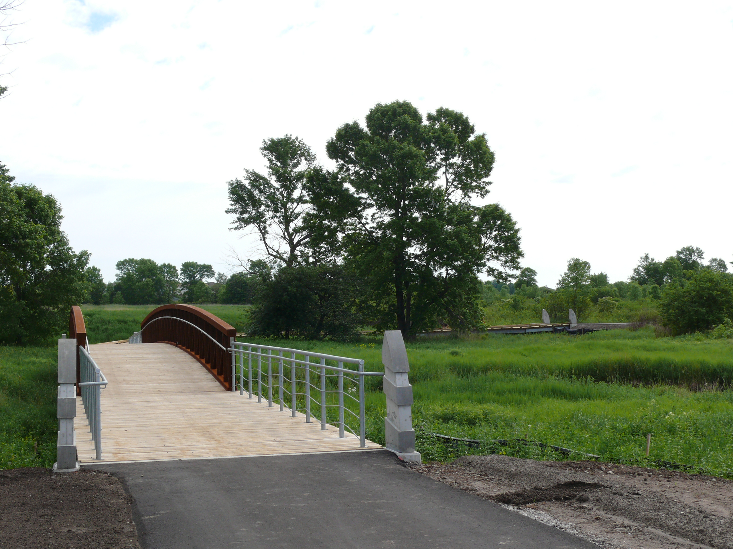 Bridge in park leading to a trail