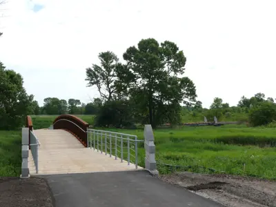 Bridge in park leading to a trail