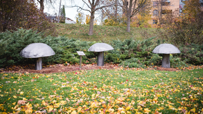 Three metal mushrooms in the Oshawa Valley Botanical Garden