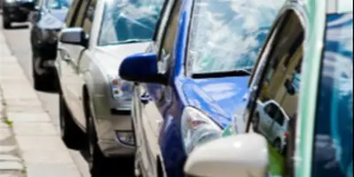 Cars parking in a row